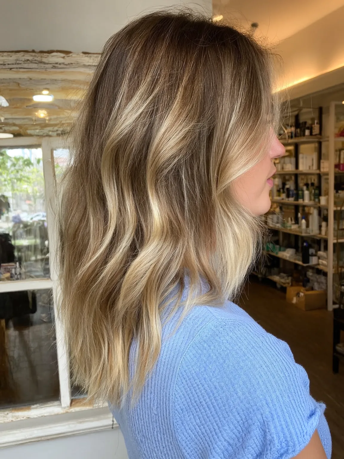 Medium Volume Sandy Blonde Balayage Wavy Lob