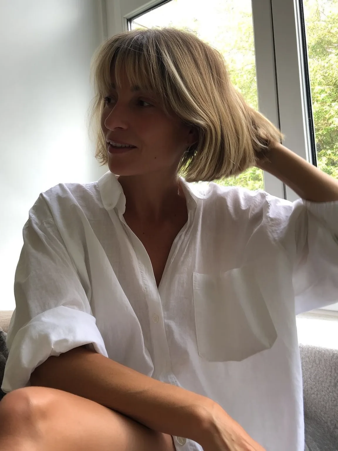 Sandy Blonde Straight Chin-Length Bob with Natural Highlights