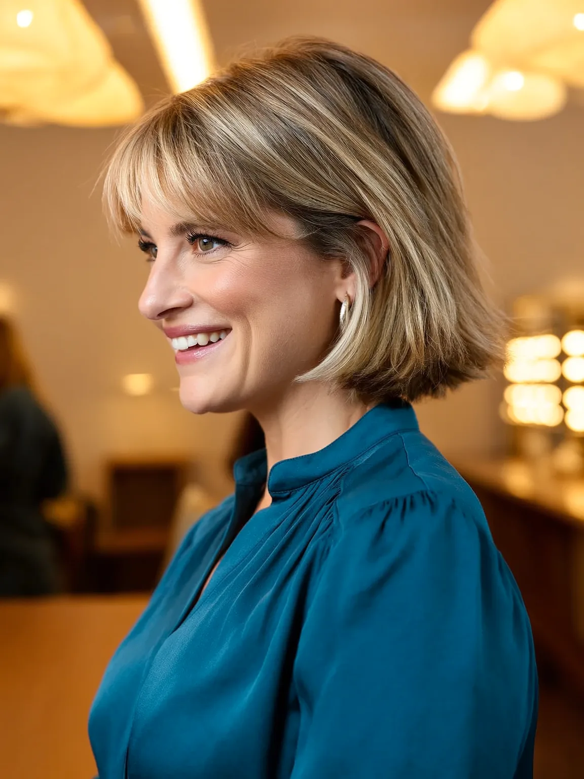 Chin-Length Classic Bob with Soft Sandy Blonde Highlights