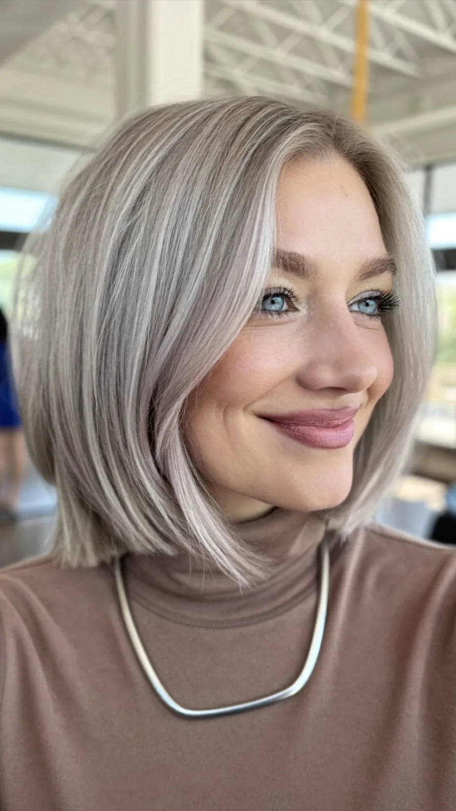 Chic Platinum Blunt Bob With Soft Face-Framing Layers