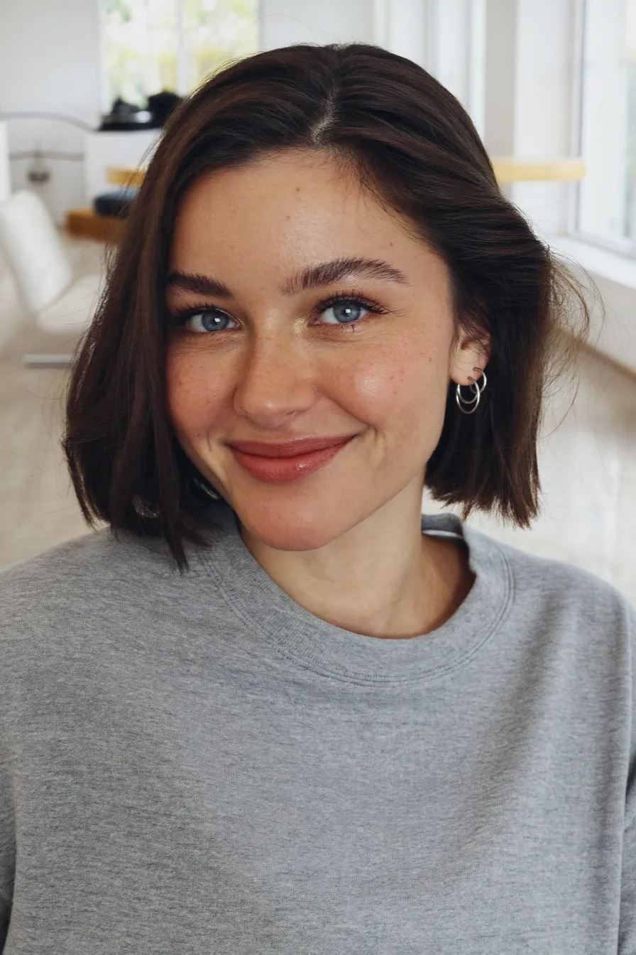 Sleek Chin-Length Blunt Bob with Defined Natural Texture