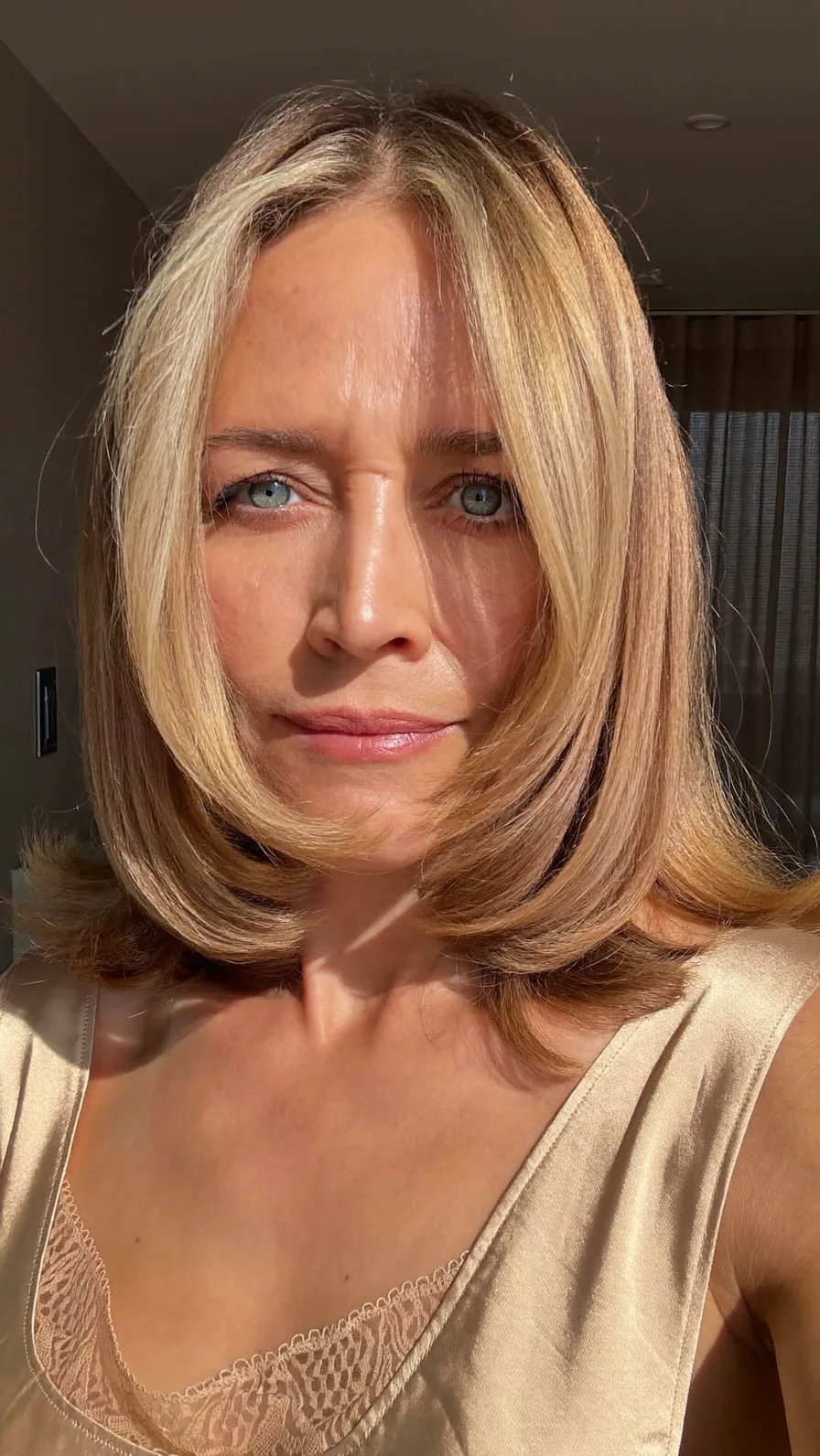 Elegant Medium-Length Blunt Bob with Soft Flicked Ends