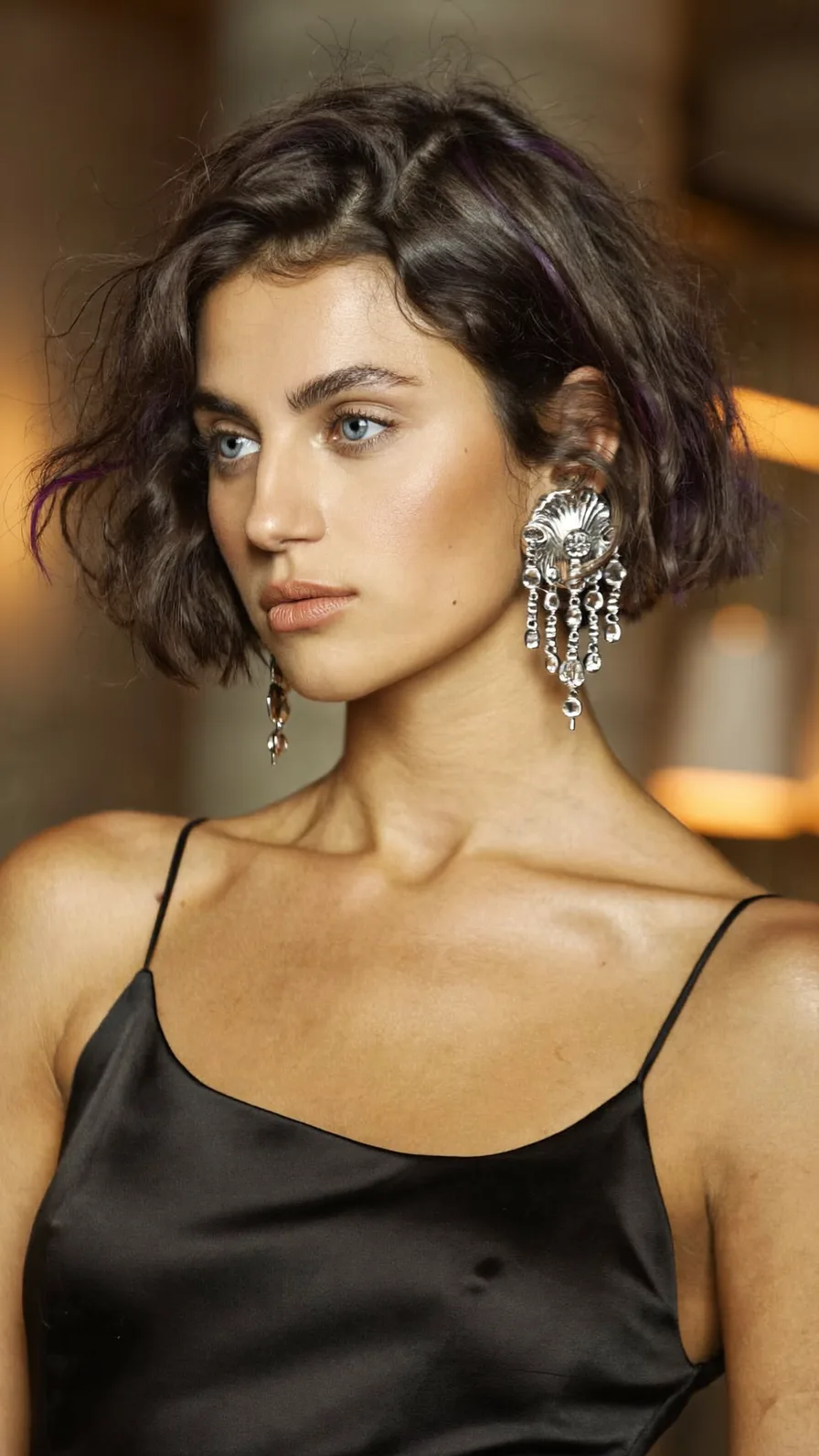 Modern Textured Chin-Length Bob with Subtle Purple Highlights
