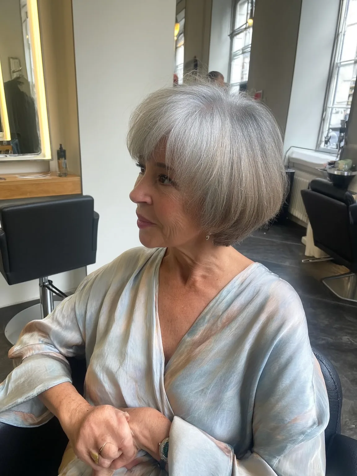 Chin-Length Silver Frost Bob with Bold Blunt Bangs