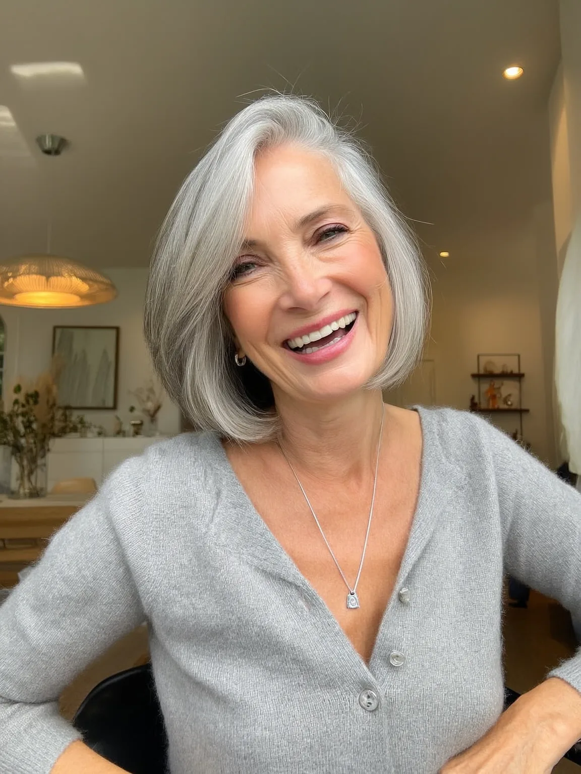 Silver Frost Bob with Side-Swept Bangs and Sleek Shine