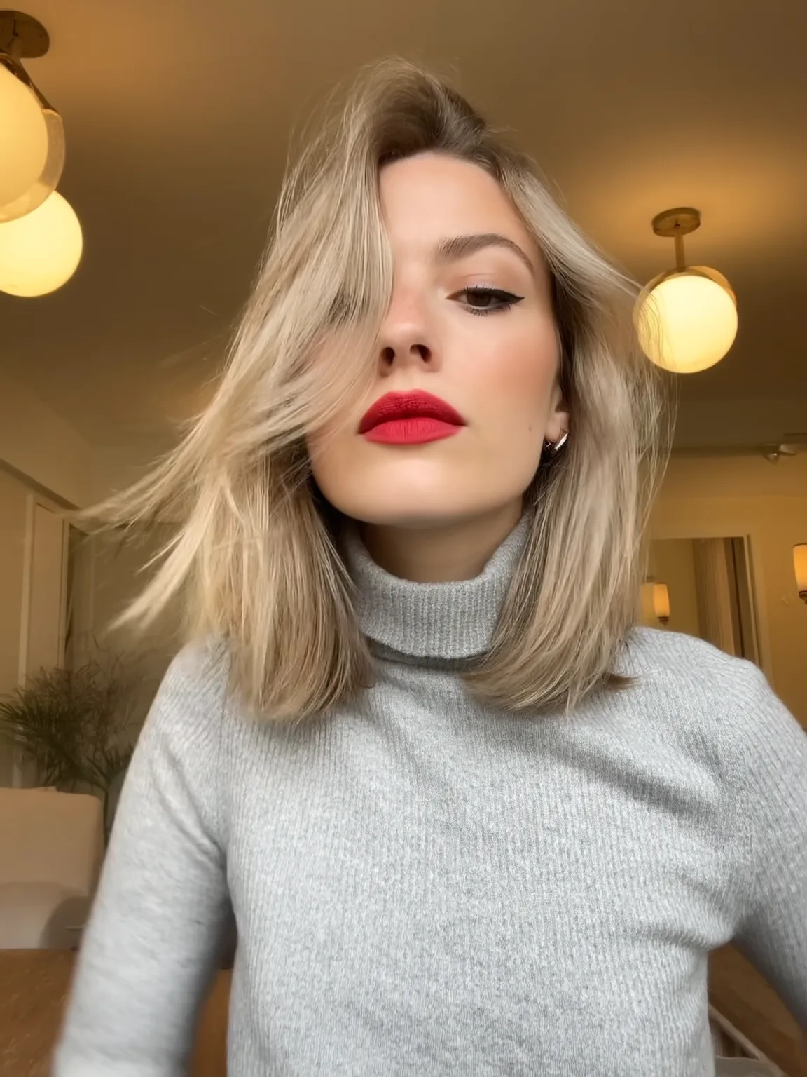 Sandy Blonde Lob with Side-Swept Bangs for Heart Shapes
