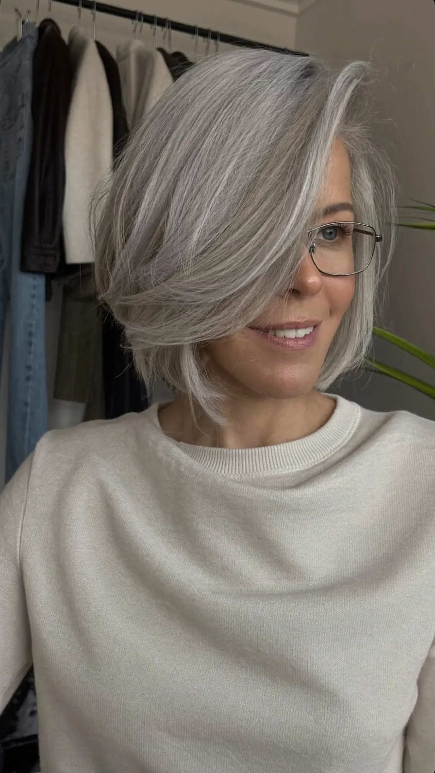 Elegant Side-Swept Silver Bob with Flowing Long Layers
