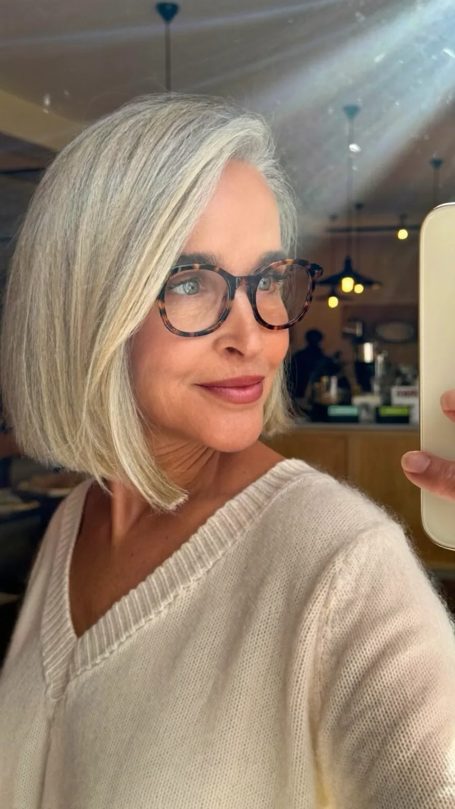 Sleek Side-Parted Chin-Length Silver Gray Bob Hairstyle