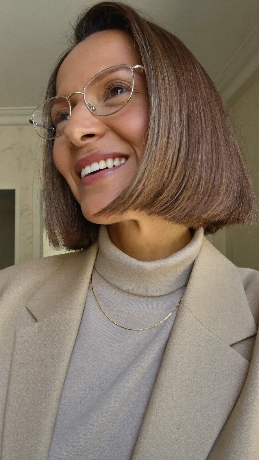 Sleek Chin-Length Blunt Bob with Natural Ash Brown Hue