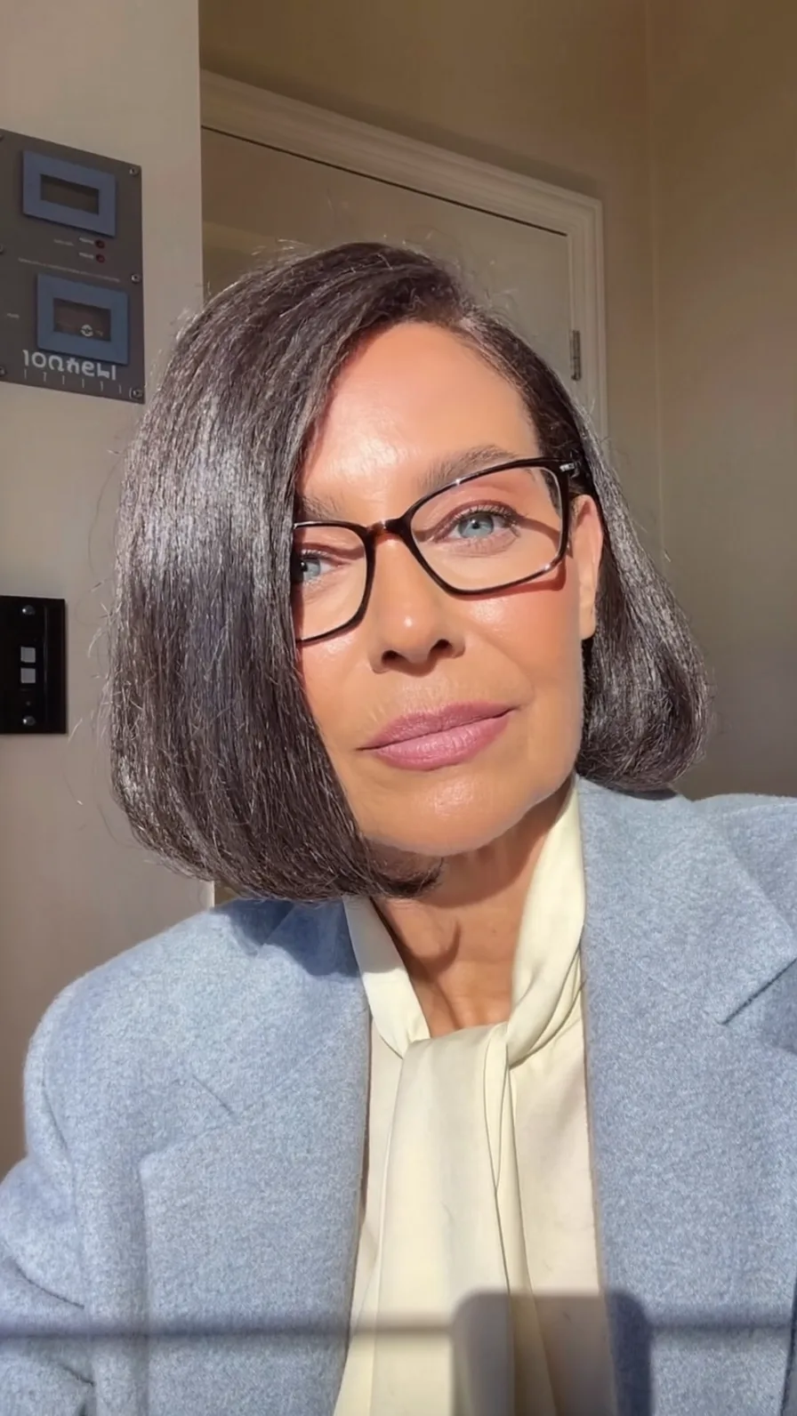 Sophisticated Chin-Length Blunt Bob with Deep Side Part