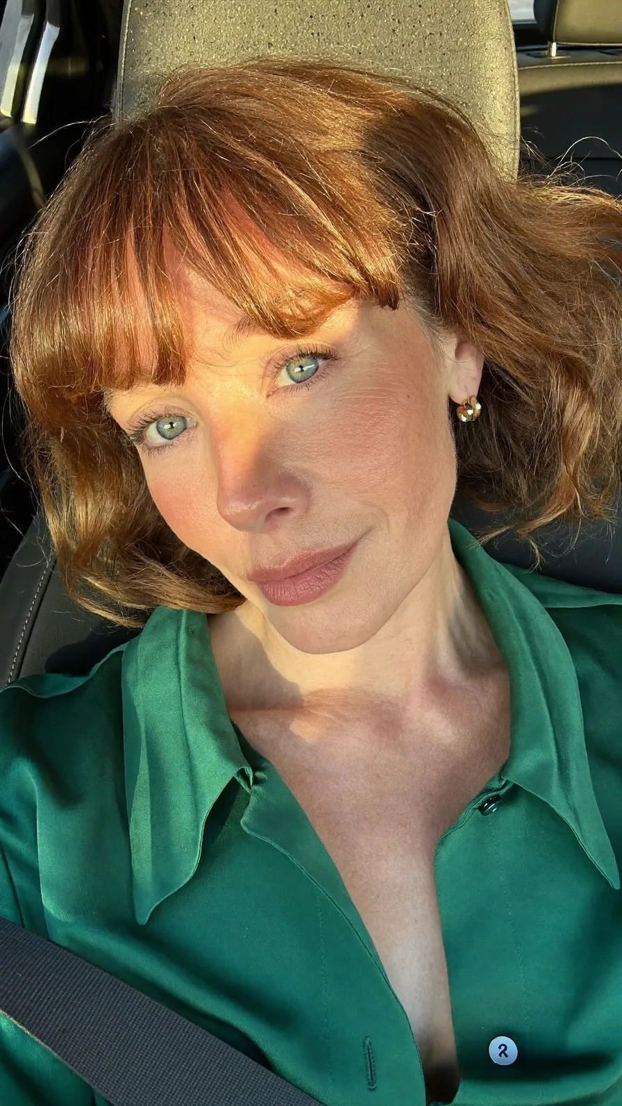 Chin-Length Warm Copper Bob with Blunt Bangs Style