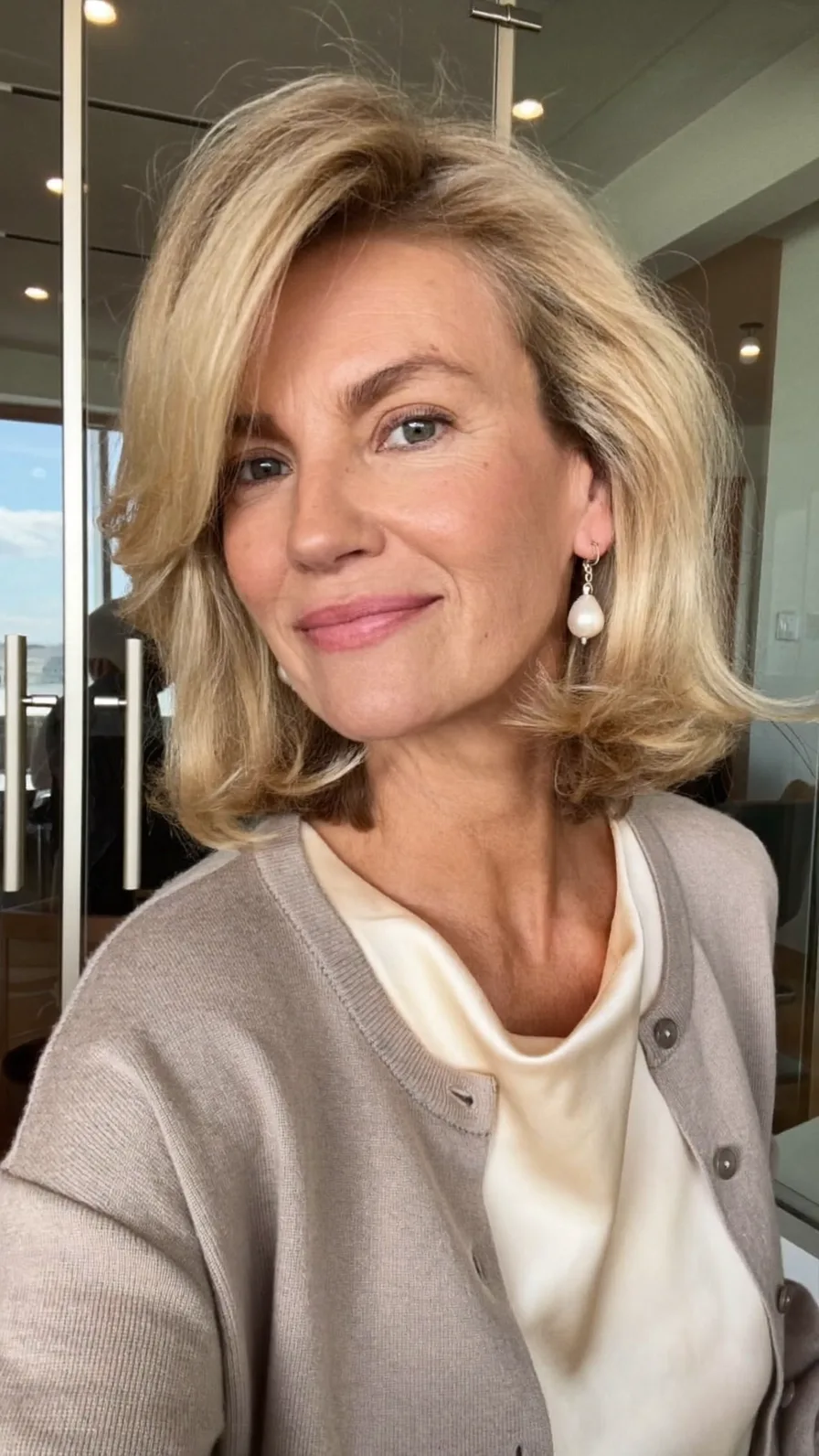Classic Layered Shoulder-Length Bob with Side-Swept Bangs