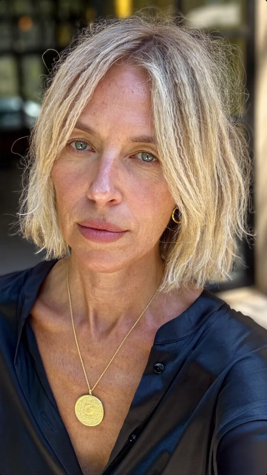 Choppy Textured Chin-Length Cool Ash Blonde Bob