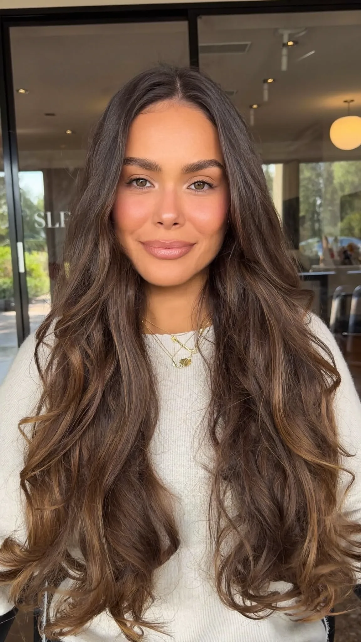 Natural Brunette Mid-Back Long Layered Waves with Solid Color