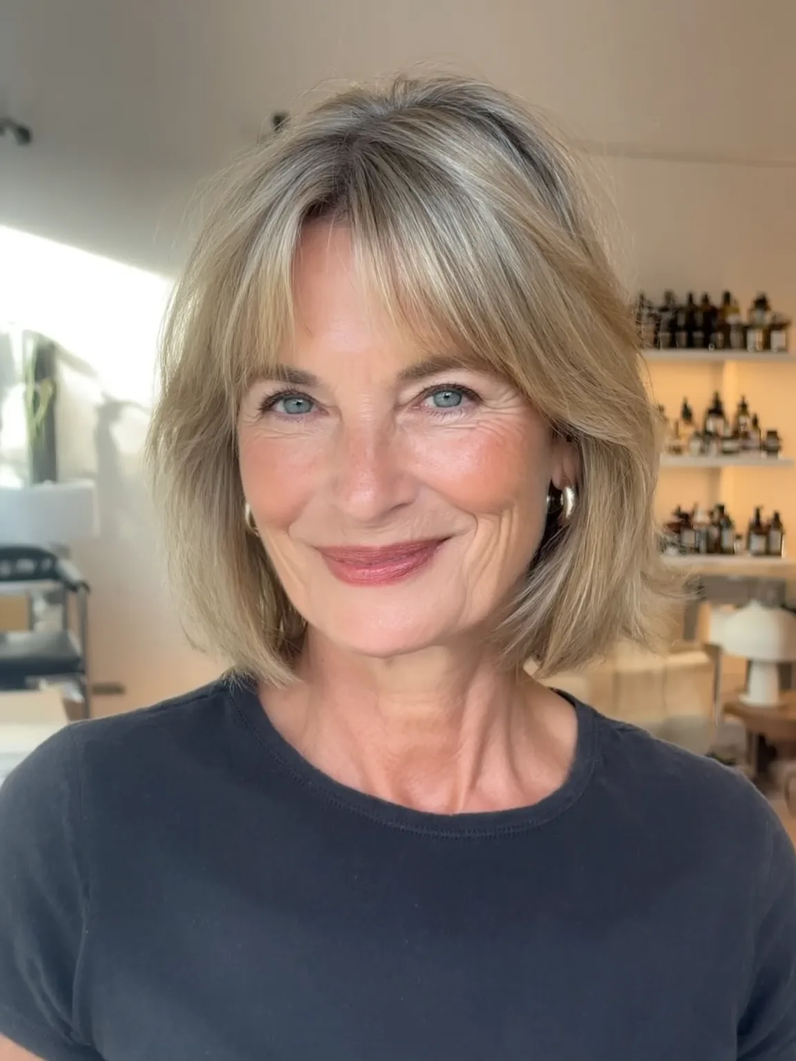 Straight Sandy Blonde Bob with Curtain Bangs and Lowlights
