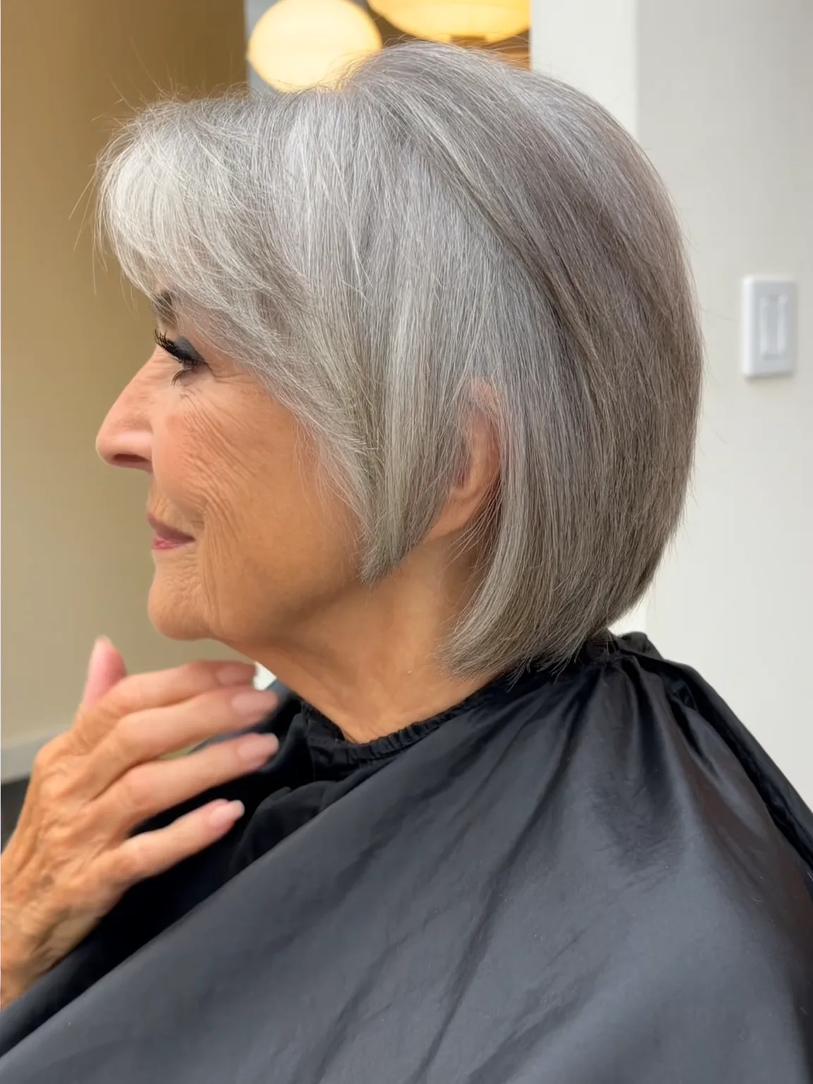 Straight Silver Frost Bob with Side-Swept Bangs and Medium Volume
