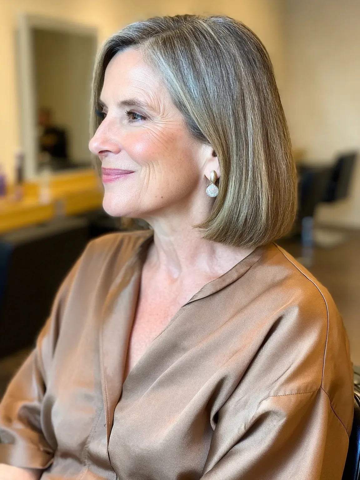 Ash Blonde Straight Bob with Silver Highlights and Side Bangs