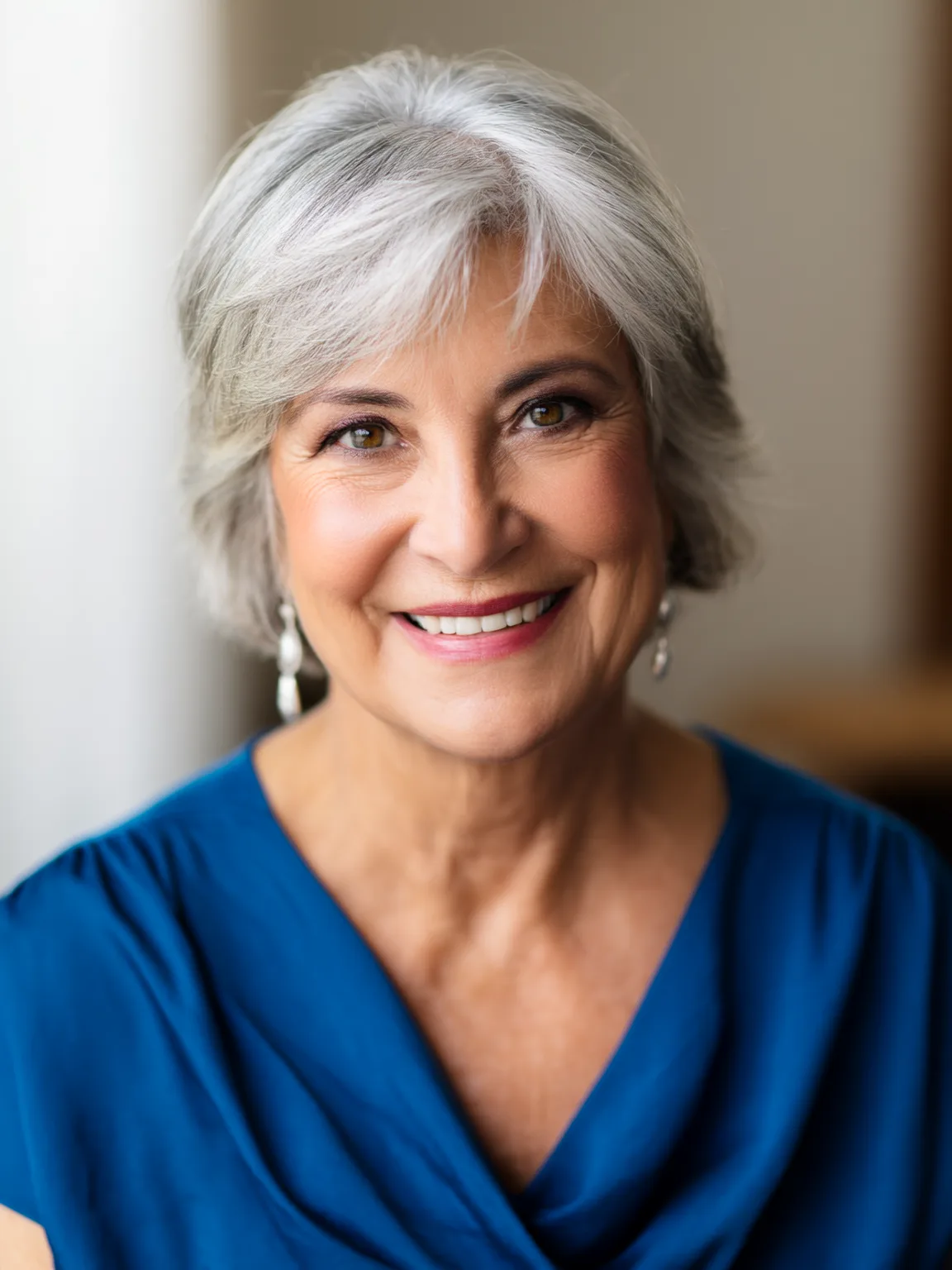 Sleek Silver Frost Bob with Side-Swept Bangs for Oval Faces