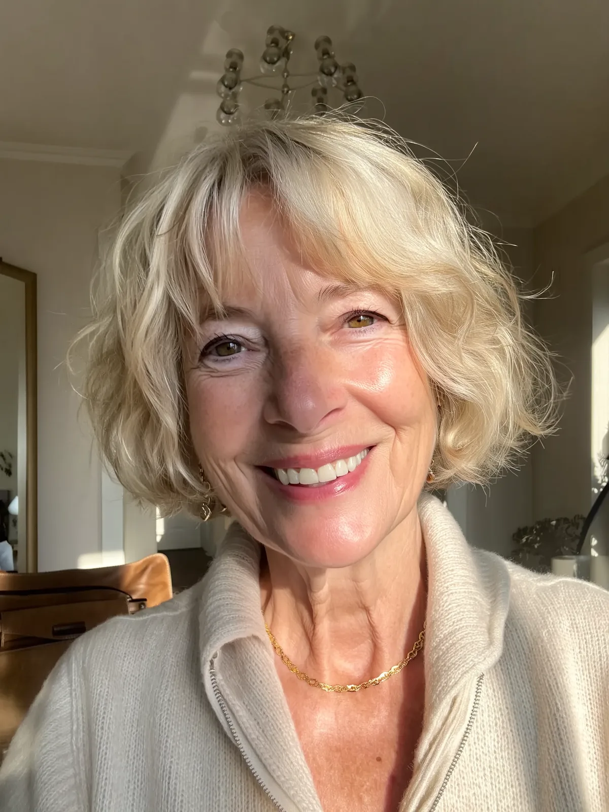 Soft Sandy Blonde Wavy Bob with Wispy Bangs