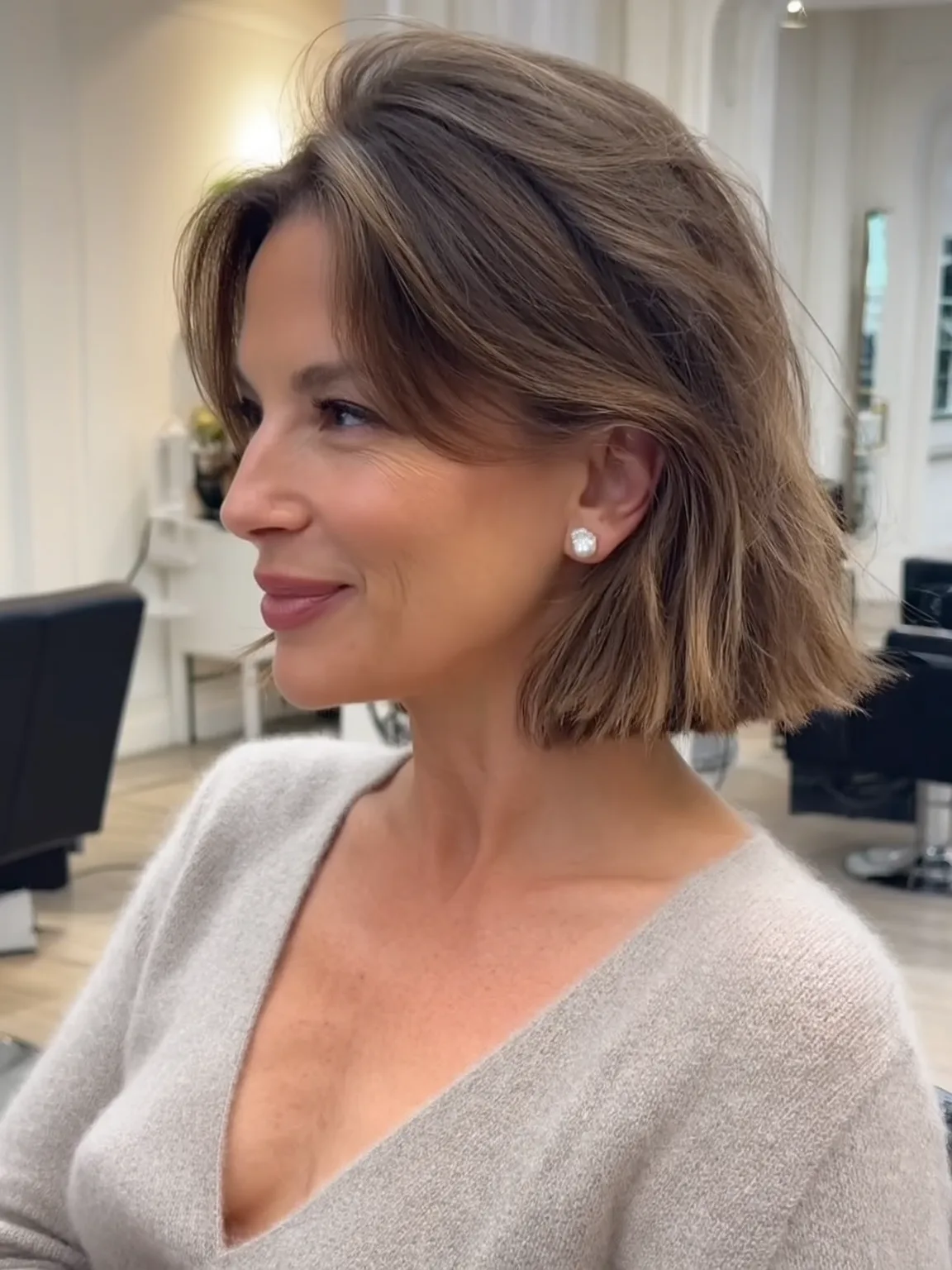 Medium Volume Wavy Warm Caramel Bob with Side-Swept Bangs