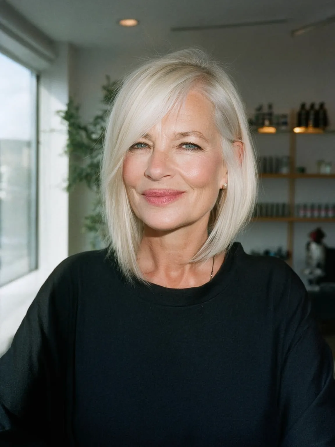 Silver Frost Bob with Side-Swept Bangs and Medium Volume