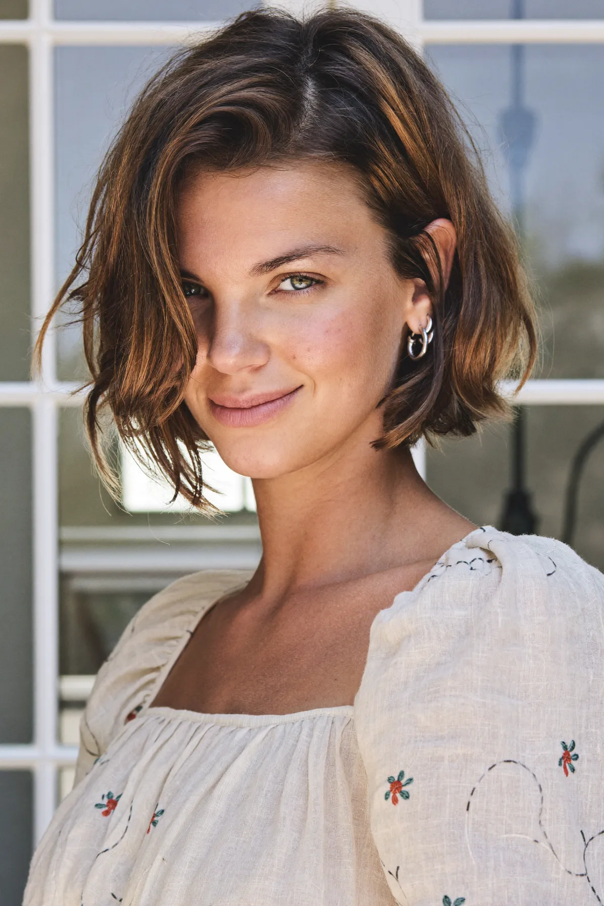 Chin-Length Natural Brunette Wavy Bob With Solid Color Finish