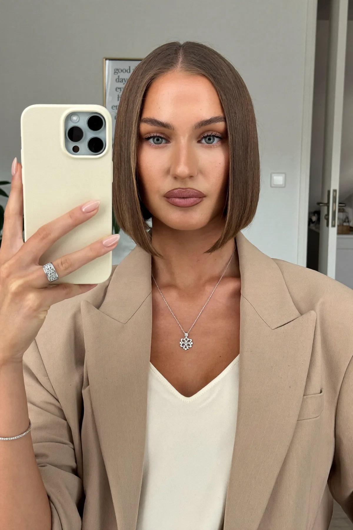 Sleek Chin-Length Natural Brunette Bob Without Bangs
