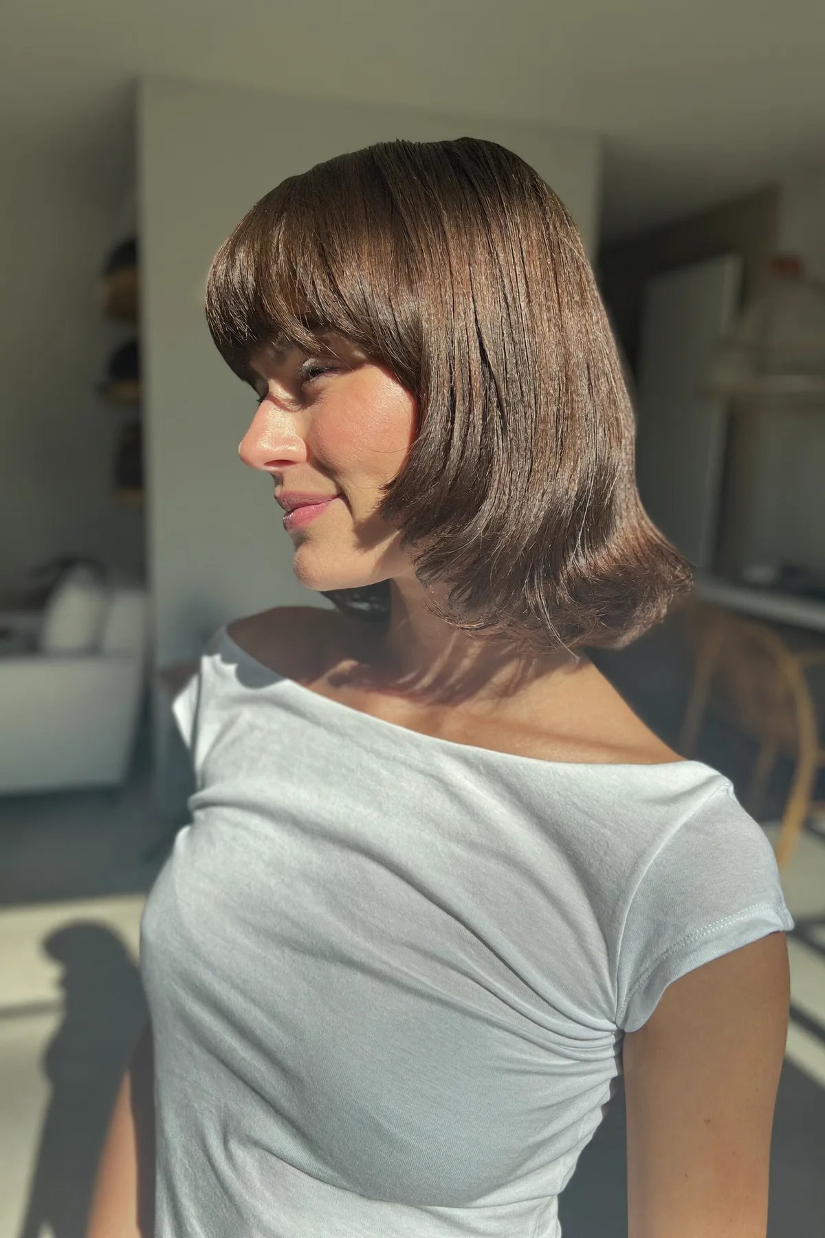 Sleek Chin-Length Natural Brunette Bob with Full Fringe Bangs