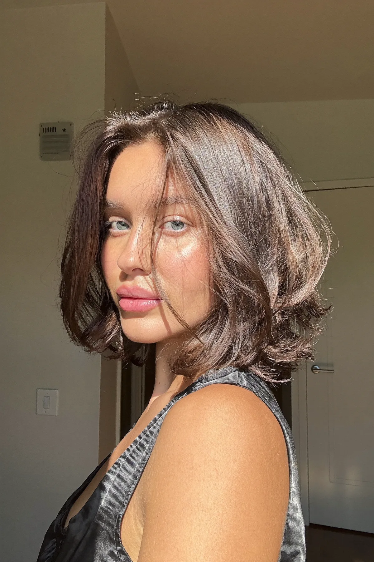 Chin-Length Natural Brunette Wavy Bob for Effortless Shine