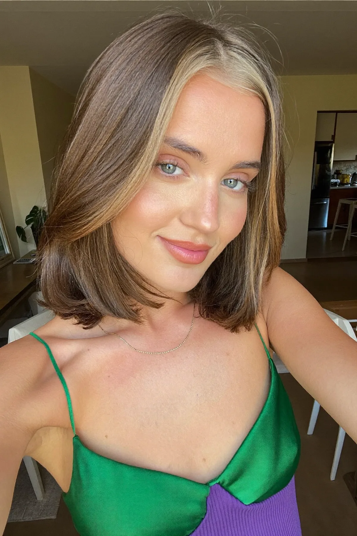 Natural Brunette Sleek Straight Bob with Chunky Face-Framing Highlights