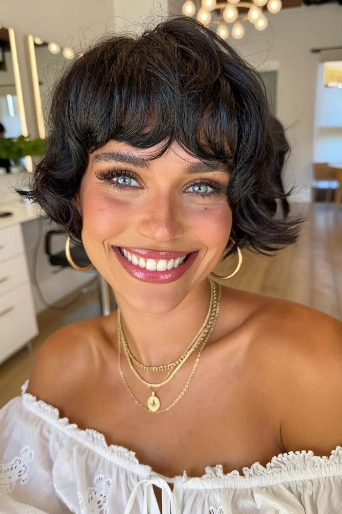 Chin-Length Wavy Bob With Full Fringe on Natural Brunette Hair