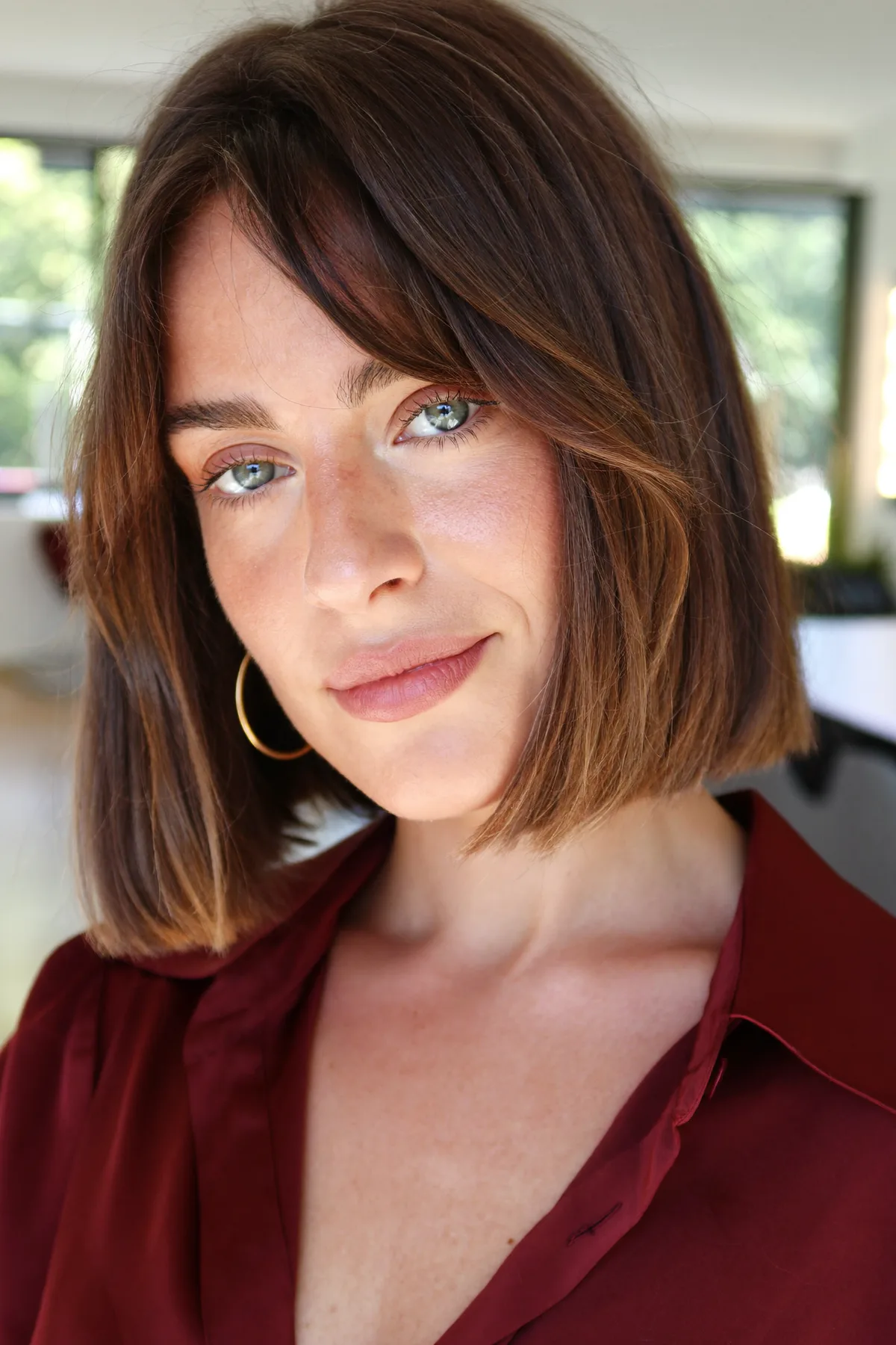 Sleek Straight Chin-Length Bob in Natural Brunette with Curtain Bangs