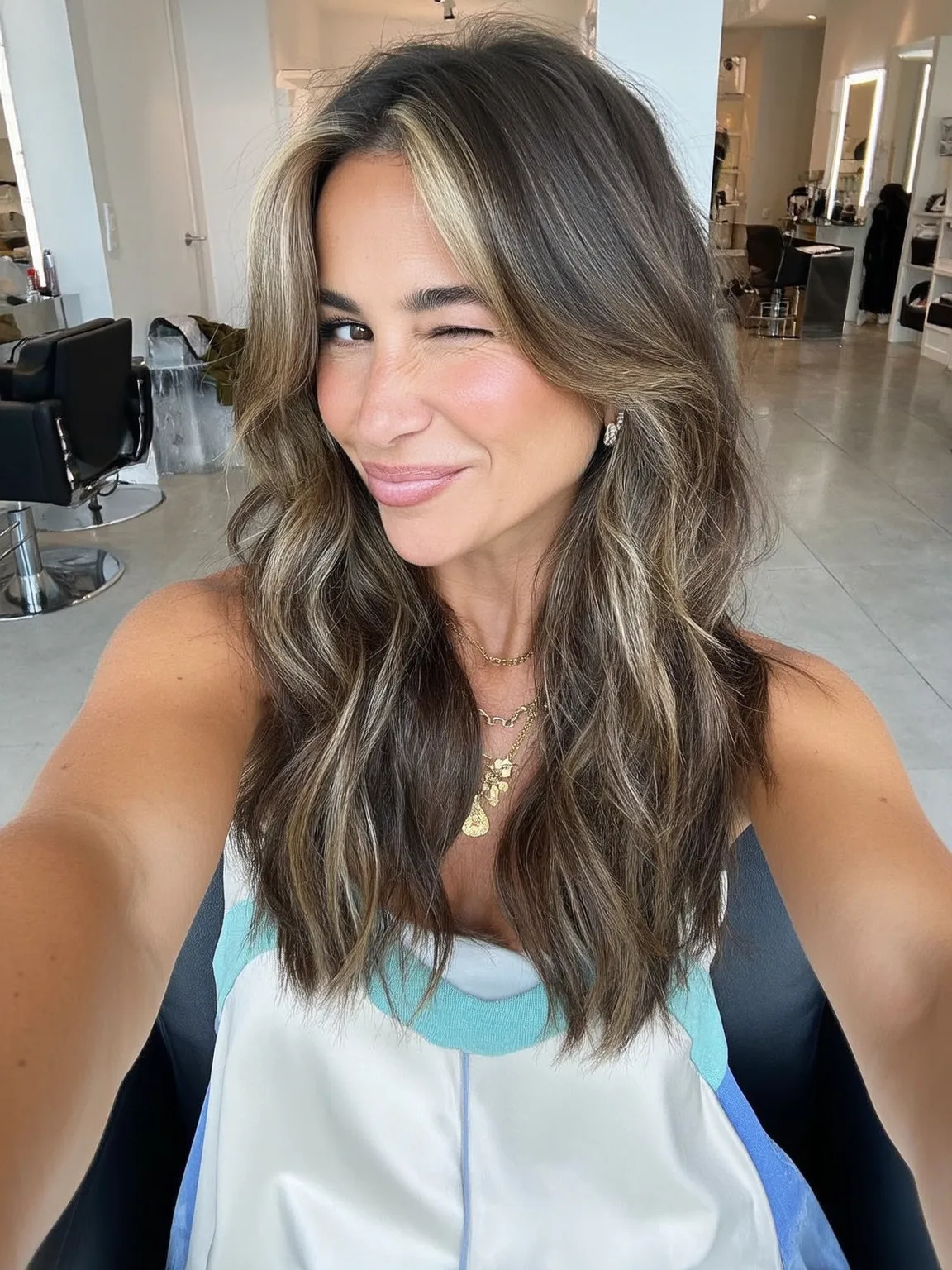 Long Wavy Layers with Honey Blonde Highlights