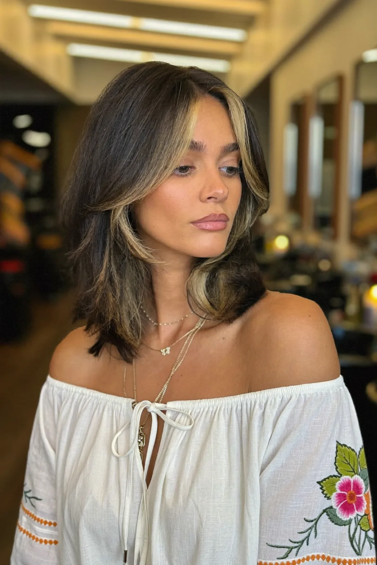 Natural Brunette Long Bob with Chunky Face-Framing Highlights