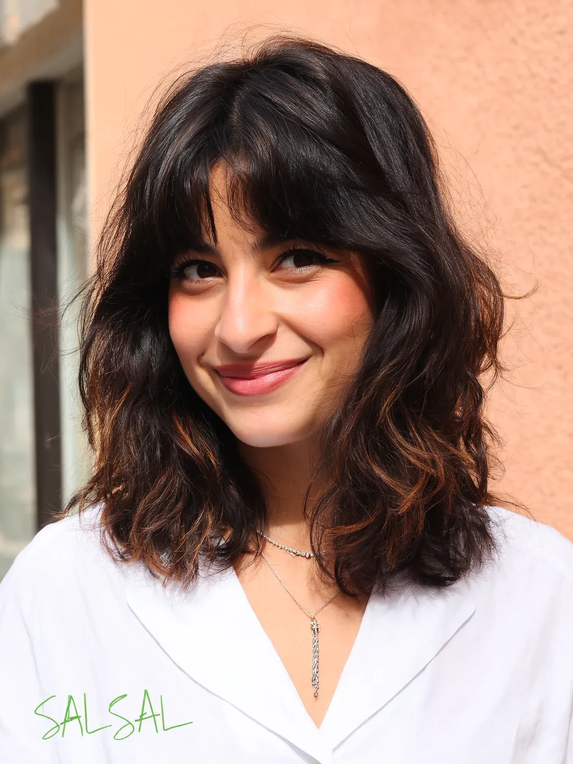 Rich Dark Brown Wavy Lob with Copper Highlights and Curtain Bangs