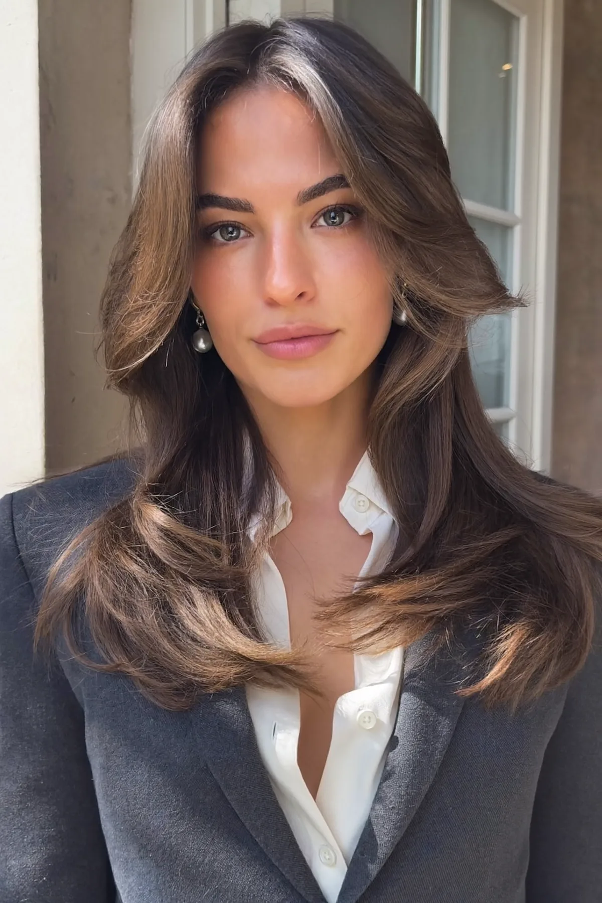Sleek Natural Brunette Collarbone-Length Lob with Curtain Bangs