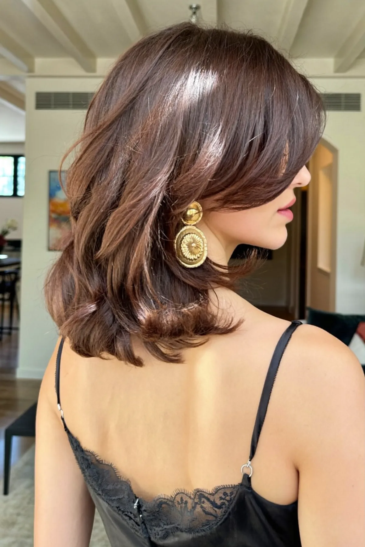 Glossy Natural Brunette Wavy Lob with Curtain Bangs
