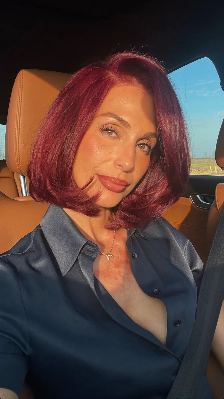 Chic Vibrant Burgundy Bob with Flicked Ends and Side Part