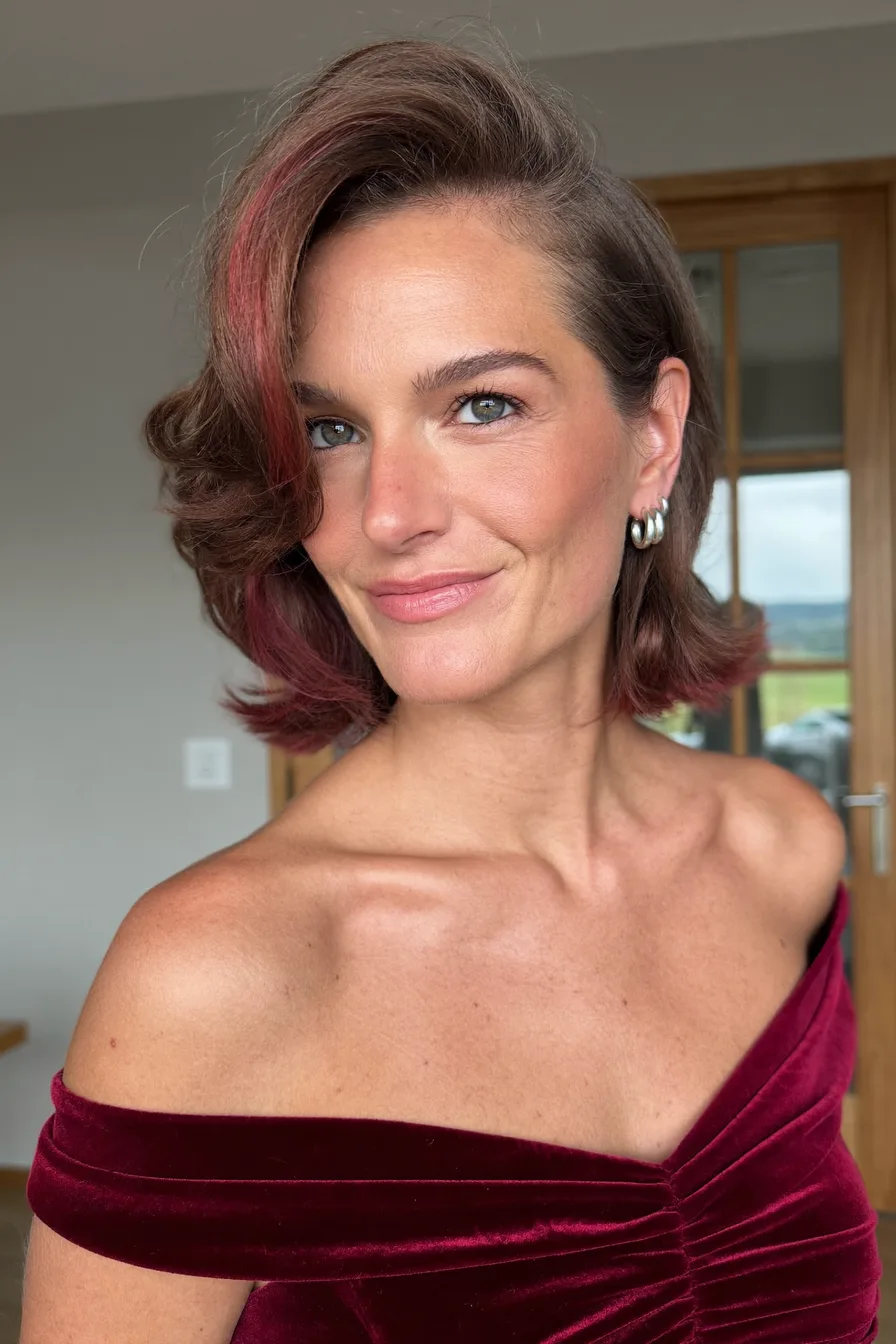 Voluminous Side-Parted Layered Bob with Burgundy Money-Piece Highlights