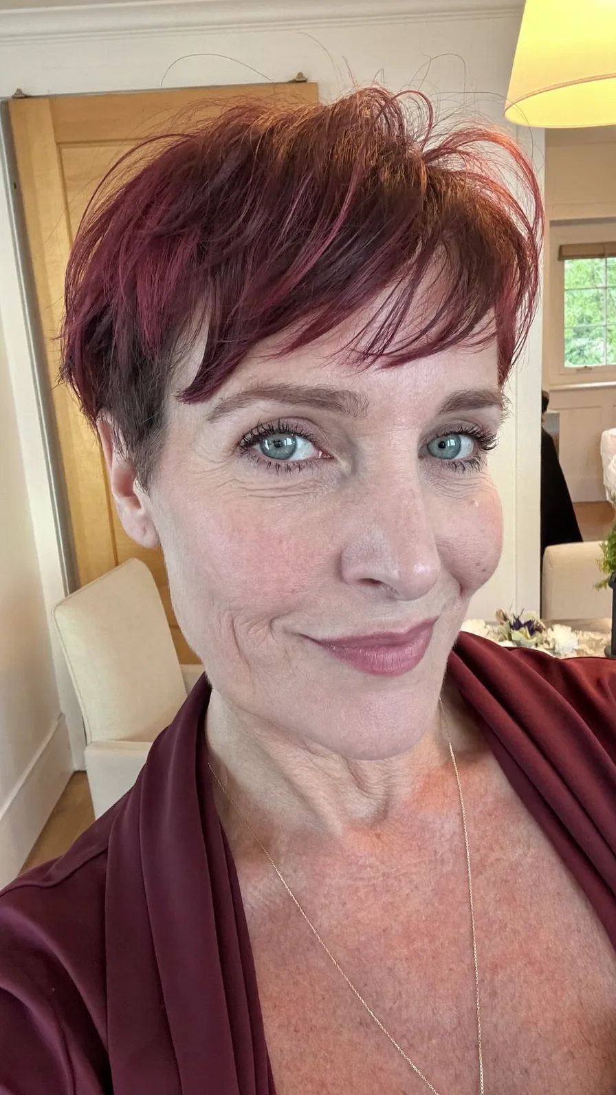 Textured Wispy Pixie Cut in Deep Burgundy Shade