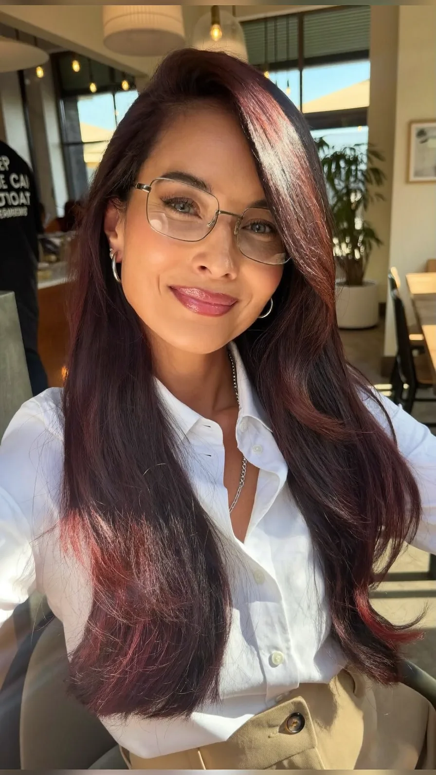 Elegant Long Layered Hairstyle with Deep Side Part and Side-Swept Bangs