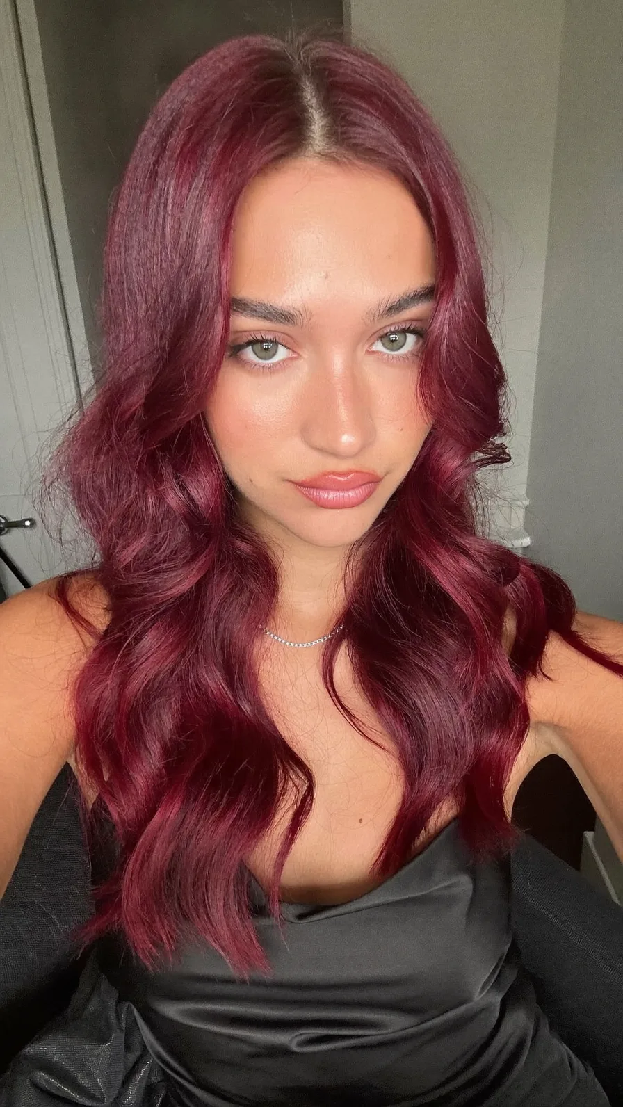 Flowing Deep Burgundy Long Layers With Curtain Bangs
