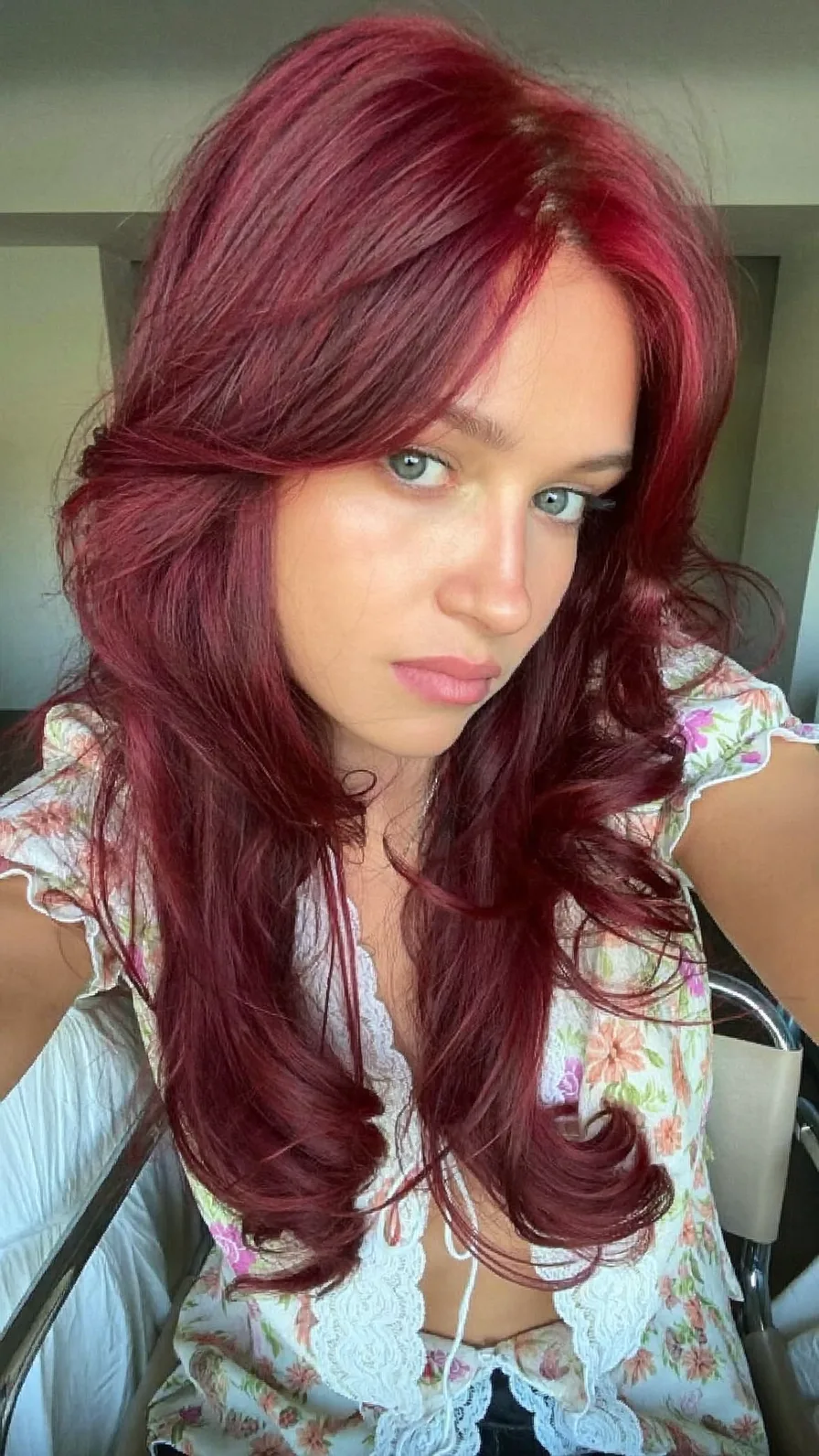 Vibrant Burgundy Long Layers with Soft Curtain Bangs