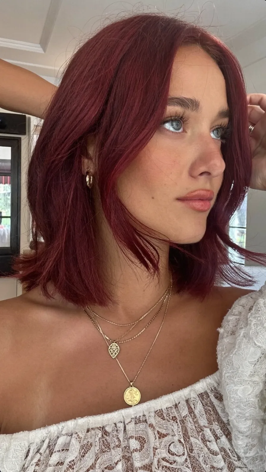 Deep Burgundy Lob with Curtain Bangs and Long Layers