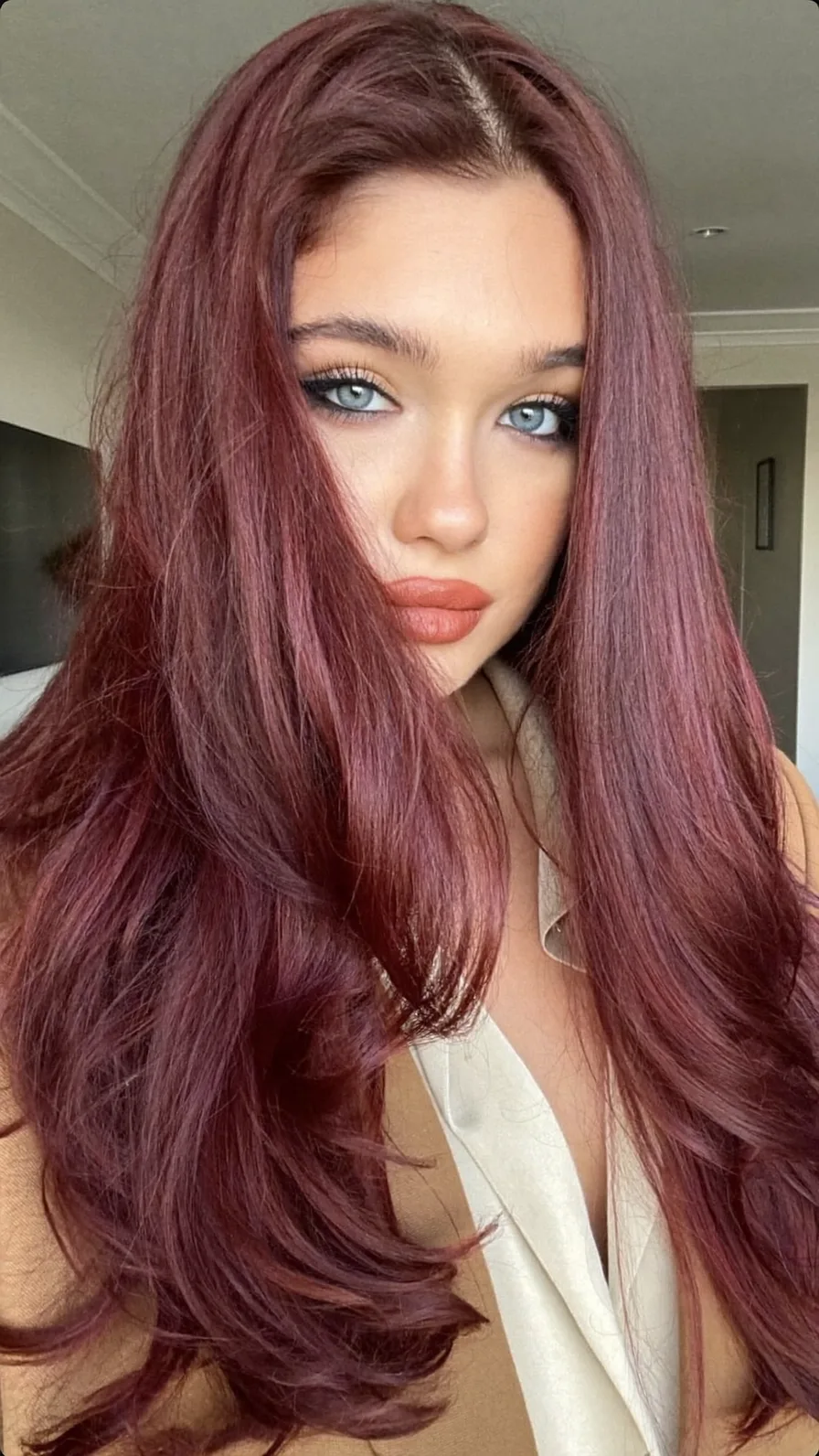 Voluminous Deep Burgundy Long Layers Hair with Center Part