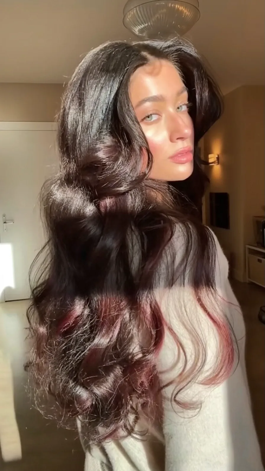 Voluminous Long Layers with Deep Chocolate and Burgundy Highlights