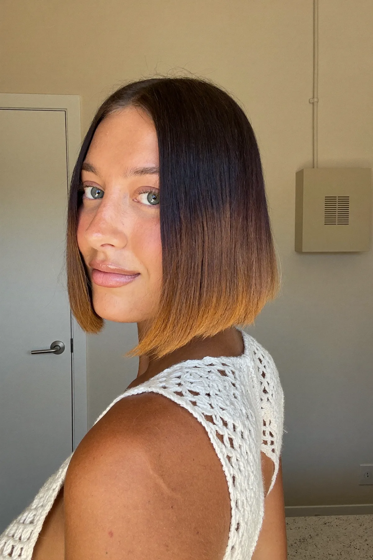 Sleek Straight Chin-Length Bob with Caramel Bronde Balayage