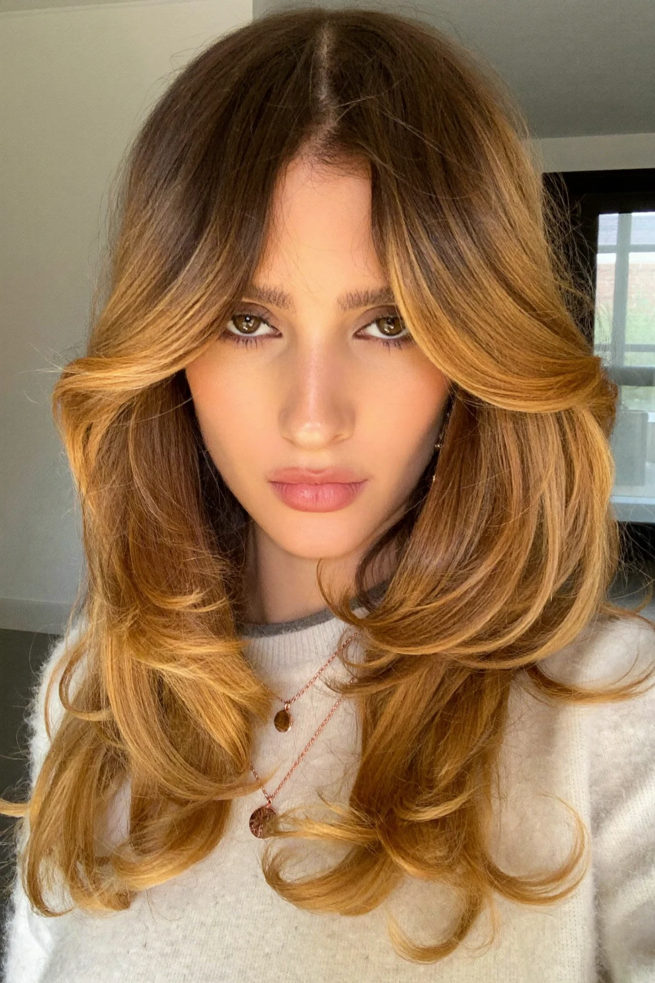 Collarbone Lob with Loose Undone Waves and Warm Caramel Highlights