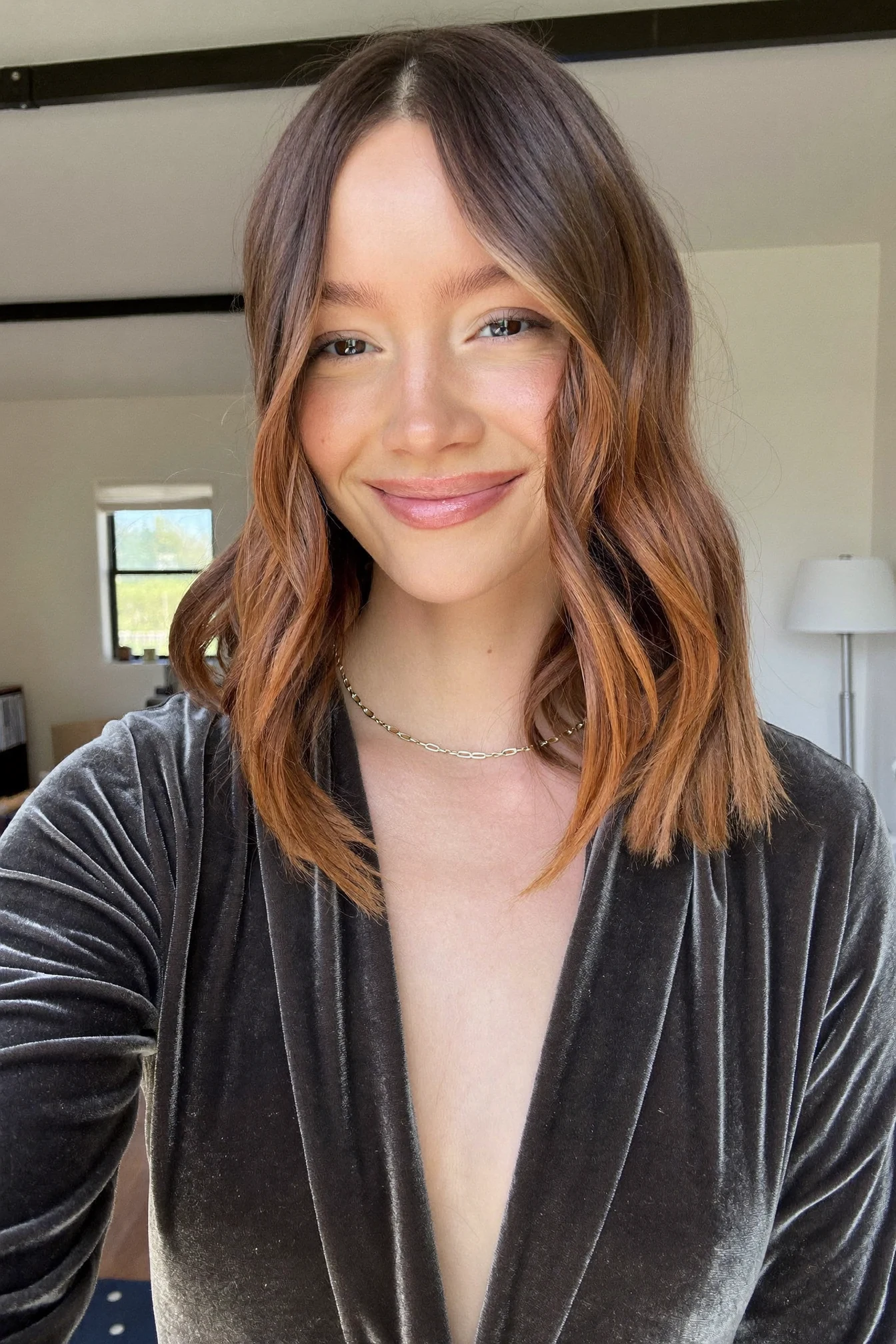 Shoulder-Length Lob with Middle-Part and Tucked Sides