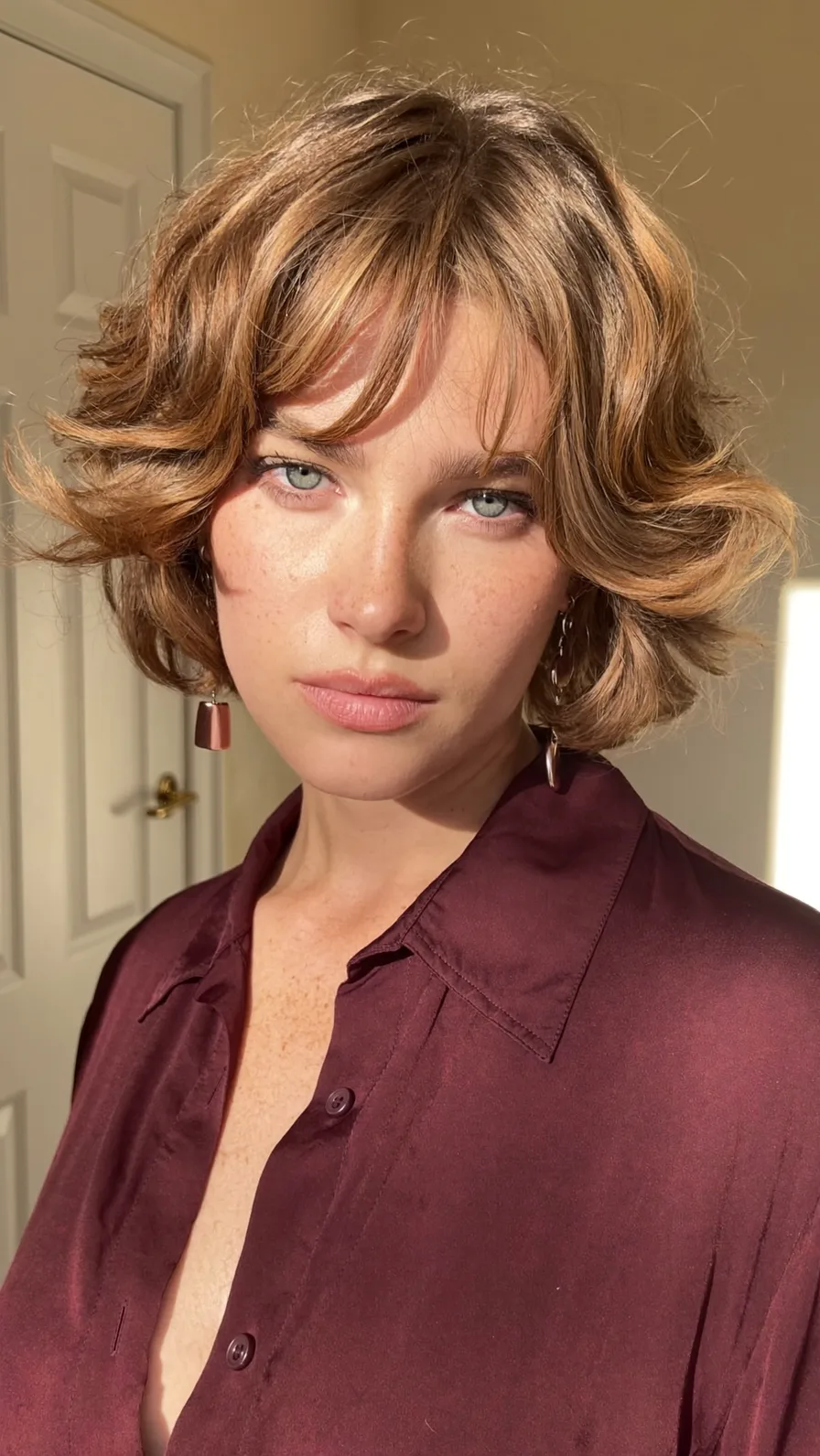 Charming Soft Layered Chin-Length Bob with Curtain Bangs